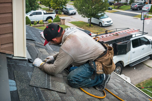 Professional Roofing technician working in New Richmond, WI
